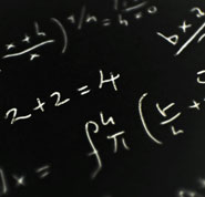 Photo of mathematical equations on a blackboard to illustrate the mathematical nature of our laws of nature, another evidence that God exists.