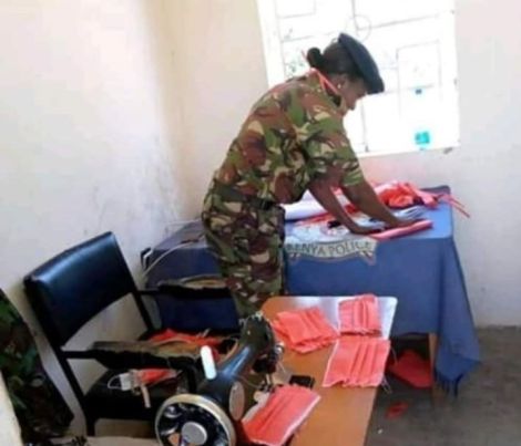 Constable Caroline Makena making protective face masks at her precinct in Elgeyo Marakwet.