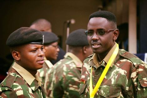 Corporal Sammy Ondimu Ngare (right) pictured alongside his colleague.