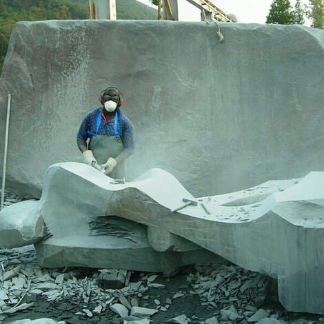 Gerald Motondi at work carving soap stone