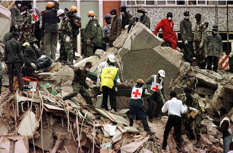 Rescue workers at the wreckage near the U.S. Embassy following the bombing, in Nairobi, 1998.